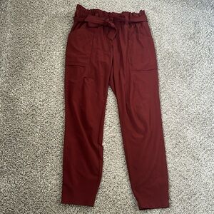 Athleta paper bag pants. Deep rust color.